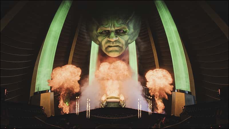 OZ at center stage, surrounded by swirling green smoke, creating an otherworldly atmosphere